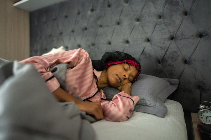 Mid adult woman sleeping in the bedroom