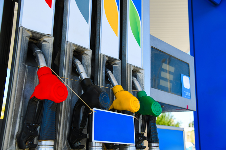 Gas station. Pistols with gasoline and diesel fuel at a car gas station